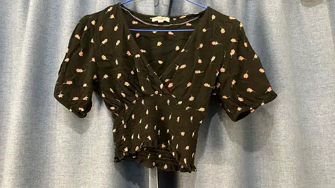 Black floral wrap-style cropped blouse, size XXS