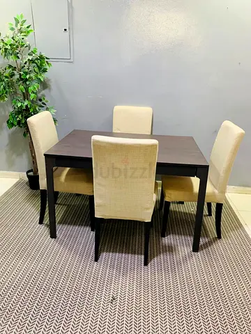 Compact 4-Seater Dining Table with Cream Upholstered Chairs