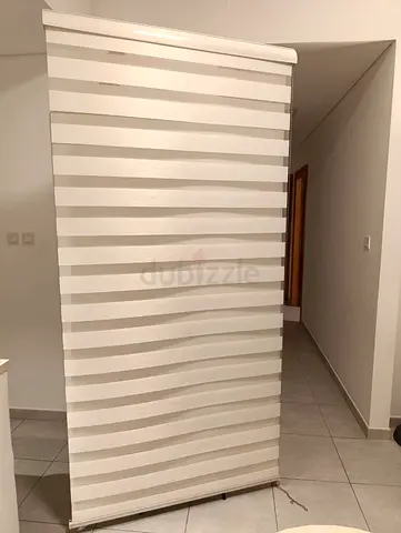 Two Zeebra window blinds W:112 H:290