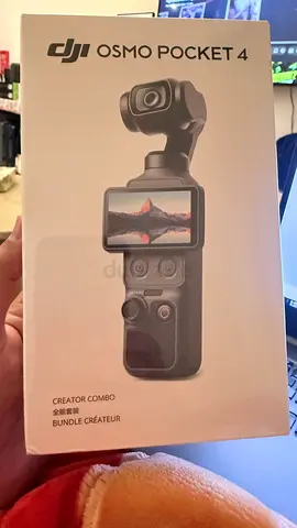 DJI Osmo Pocket 4 Creator Combo - Brand New in Box