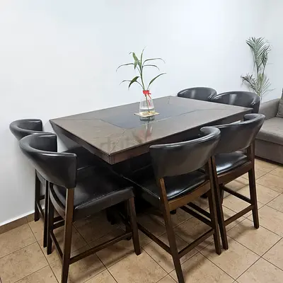 Solid Wood Dining Table with 6 Curved Leather Chairs