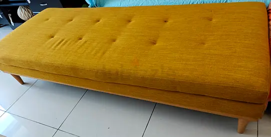 Mid-century mustard yellow upholstered bench/sofa daybed — solid wood legs
