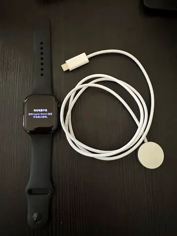Unused Apple Watch series 11 with magnetic charging cable