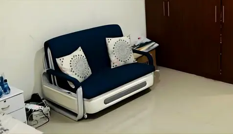 Convertible sofa bed (white metal frame, blue mattress) - good condition