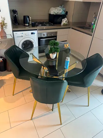 Glass Top Round Dining Table with 4 Green Upholstered Chairs