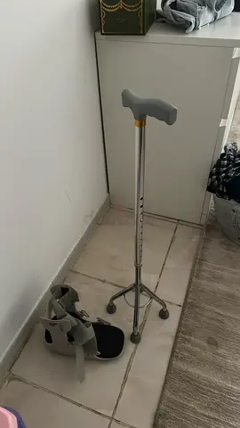 Walking boot and walking stick