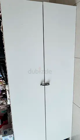 White Two-Door Wardrobe / Storage Cabinet - Good Condition - its placed horizontally in the picture
