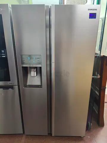 Samsung latest model door in door refrigerator side by side with water depanser and ice maker