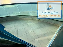 Office with 3 Rooms and Living Area for Annual Rent Directly on Ajman Corniche, Full Sea View, AED 6