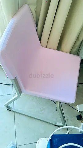 Light pink modern study table in good condition