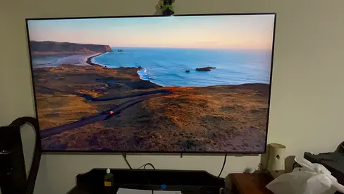 65-inch Smart LED TV in excellent working condition (wall-mounted)