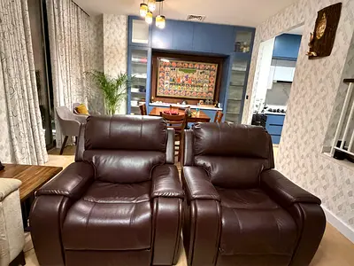 Brown leather single recliner chair - very good condition