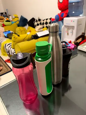 Set of 4 reusable sports water bottles (various sizes and styles)