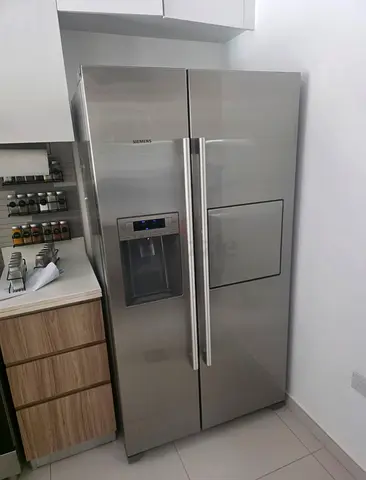 Siemens side by side fridge and freezer new model slightly used with ice maker water dispenser