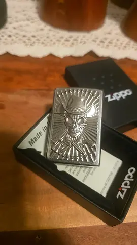 Zippo Skull & Crossed Swords Brushed Chrome Lighter (Like New) with lather cover with box