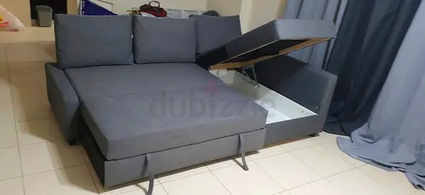 Grey L-shaped storage sofa bed - compact convertible couch with cushions