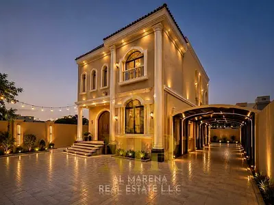 Two-story villa with a rooftop terrace in Al Rawda, price includes electricity, water, and air cond
