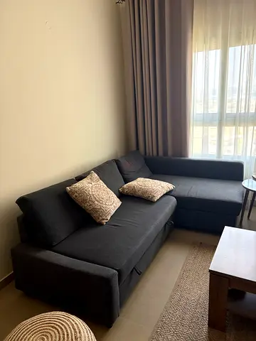 Dark grey 4-seater sofa bed - very good condition