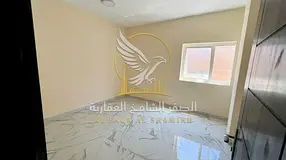 One Bedroom and Hall Al Butina Sharjah Second Occupancy Central AC Open View Free Maintenance Sandy