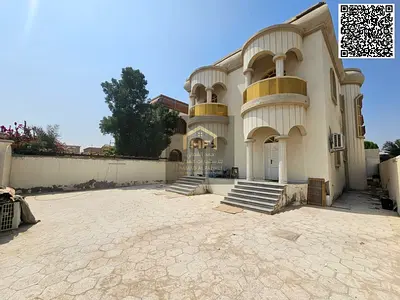 Villa for sale in Al Rawda 3 | Street and alley, 5 bedrooms + majlis and living room | Electricity, water, and AC included, freehold ownership