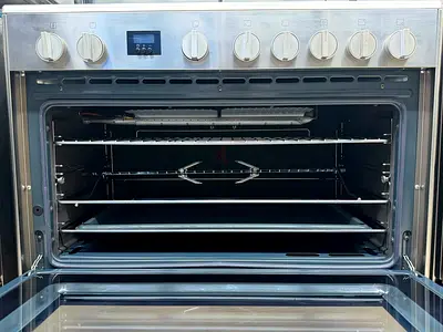 Stainless Steel Gas Range with Large Oven - Good Condition