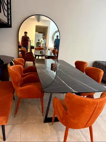 Marble-top Dining Table with 6 Orange Velvet Chairs and Orange long chair and marble top  closet
