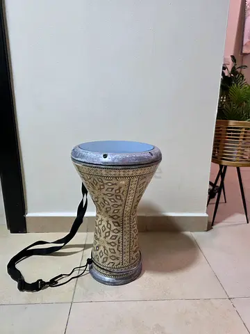 Used darbuka/doumbek hand drum with strap and extra skin Gawaharet al Fan- Good condition