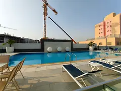 BRAND NEW BUILDING 1 BEDROOM APARTMENT WITH MAIDROOM 2 BATHROOMS GYM POOL PARKING ON PRIME LOCATION