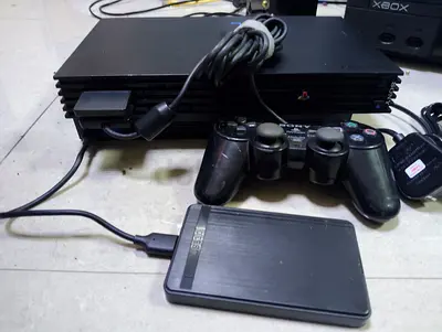 Playstation 2 Fat with loaded 120 games