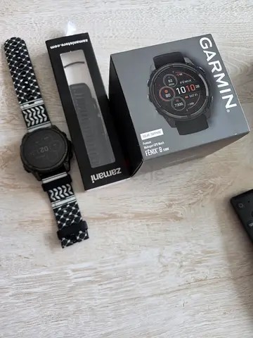 Garmin smartwatch (for parts or with extra strap) - used