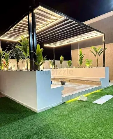 Modern Outdoor Pergola with Integrated Seating and Planters
