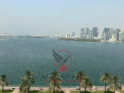 Beautiful 3 bedroom apartment with balcony sea view free AC paid by owner master maid room prime first row location on Khalid Lagoon