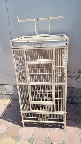 Used metal bird cage with stand - good condition
