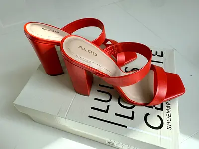 Red ALDO heeled mule shoes