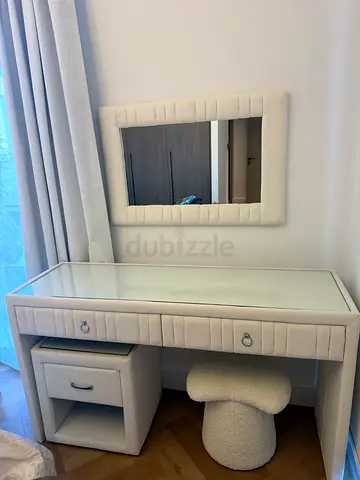 Brand The One from Dubai hills mall. White upholstered vanity dressing table with mirror and stool