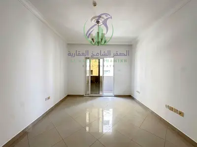 شقة غرفة وصالة للإيجار السنوي في التعاون الشارقة حمامان خزائن بالحائط مسبح وجيم مجاني شهر