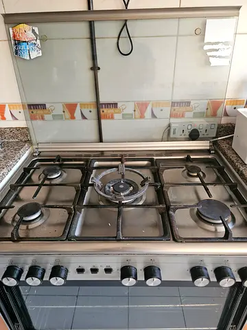 Used stainless steel 5-burner gas hob and built-in oven - good working condition