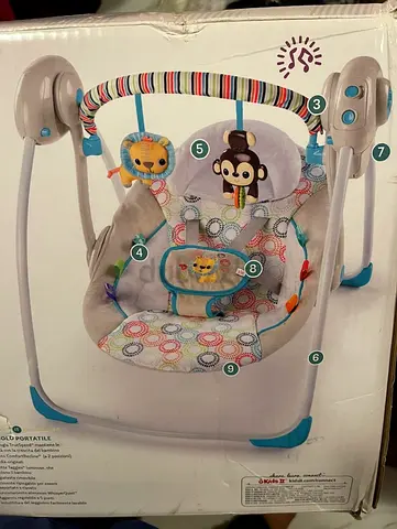 Baby rocker swing with music Used in good condition