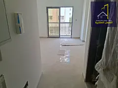 One-bedroom apartment in a modern building for rent in Muwaileh, in a prime location.