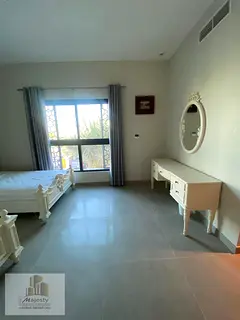 A distinctive villa in Sharjah, in the Al Rahmaniya area.