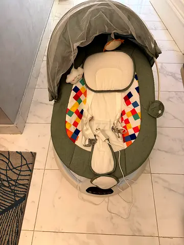 Used baby rocker/soothing swing with canopy and harness