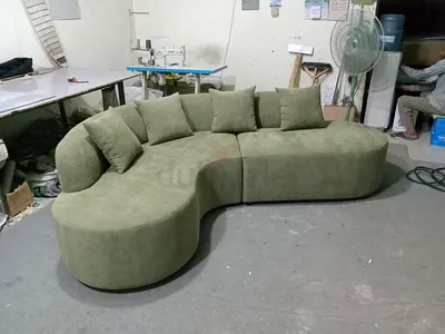 Curved Green Fabric Sofa with Cushions