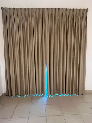 Beige full-length blackout curtains in great condition