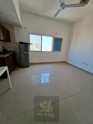 For rent in Al Nabba Sharjah large studio with central AC and central gas AED 15000 yearly payment in 4 installments deposit AED 1000 after one month