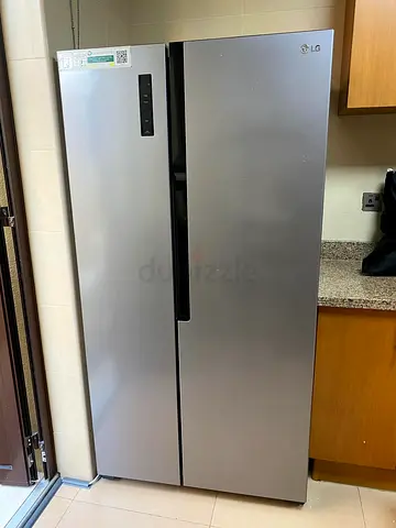 LG side by side fridge and freezer new model slightly used