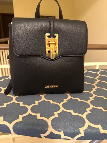 Black leather mini backpack with gold hardware - Love Moschino brand - unwanted gift
