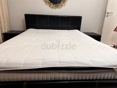 Bed queen size with two sides lethear black like new