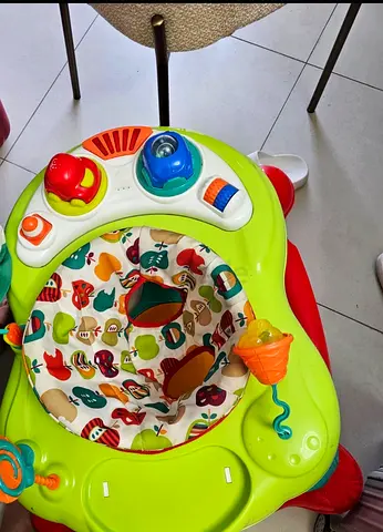 Baby activity walker with toy seat - gently used