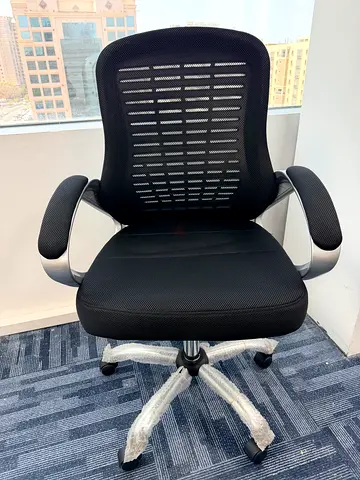 Black ergonomic office chair with lumbar support - good condition