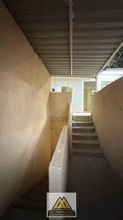 A villa available for annual rent in Al Bustan, Ajman, suitable for families, employees, or sharing.